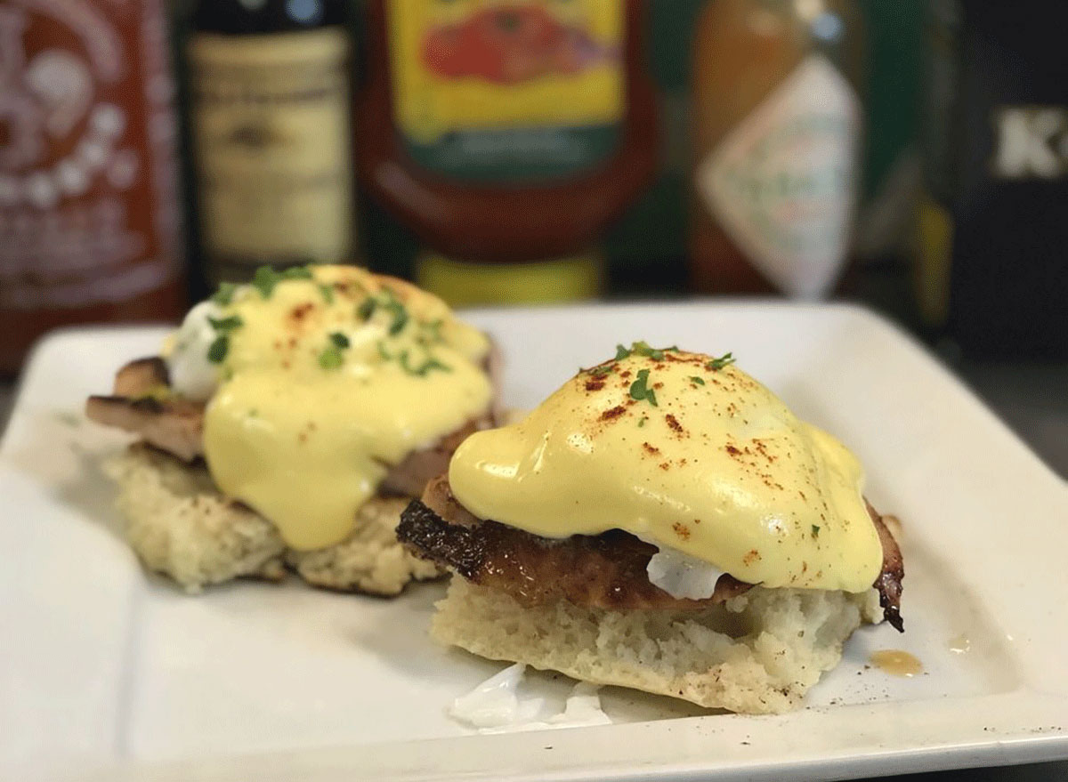 eggs benedict on a white plate from the lakewood fish & seafood