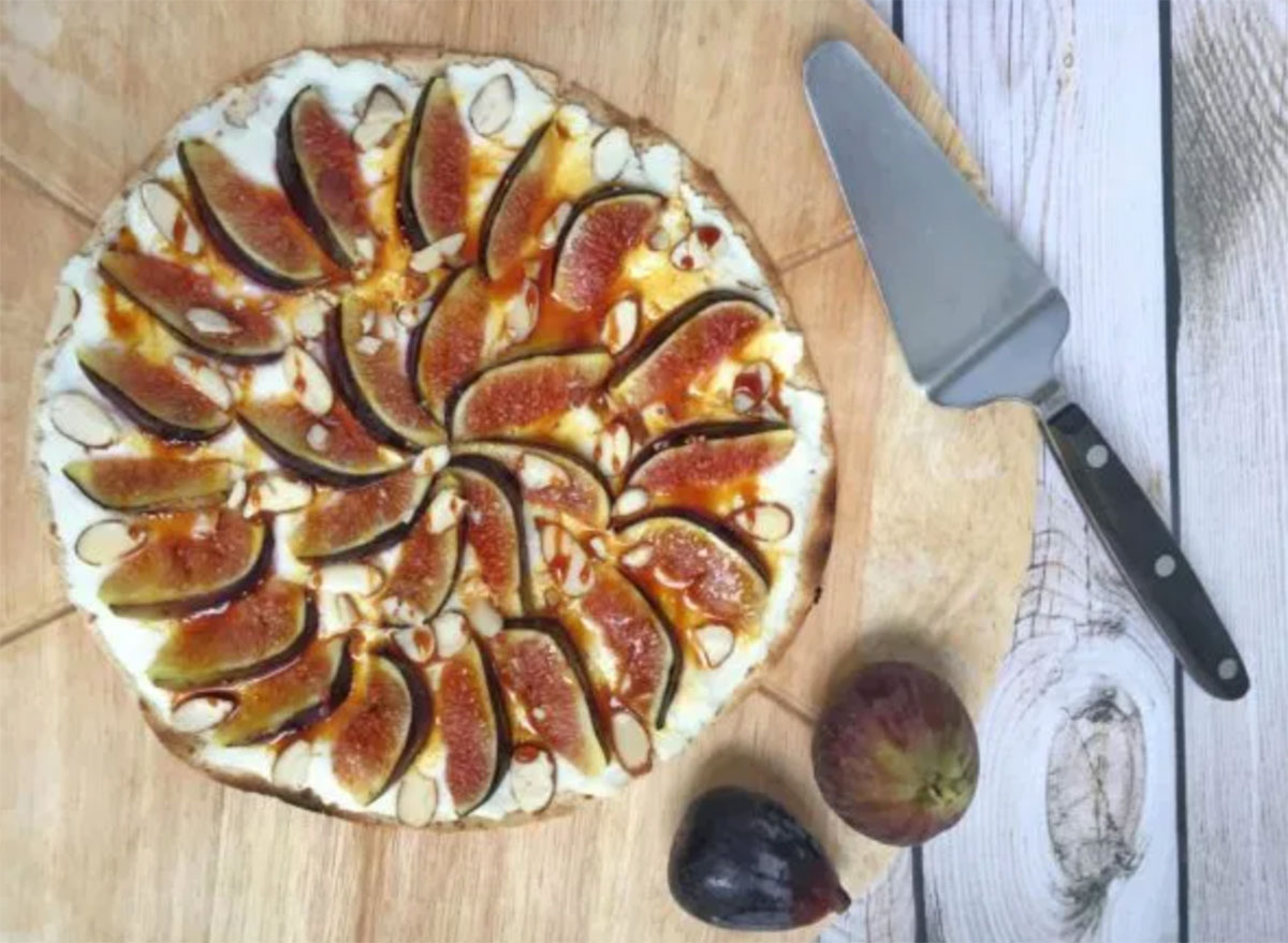 fig ricotta pizza on serving board