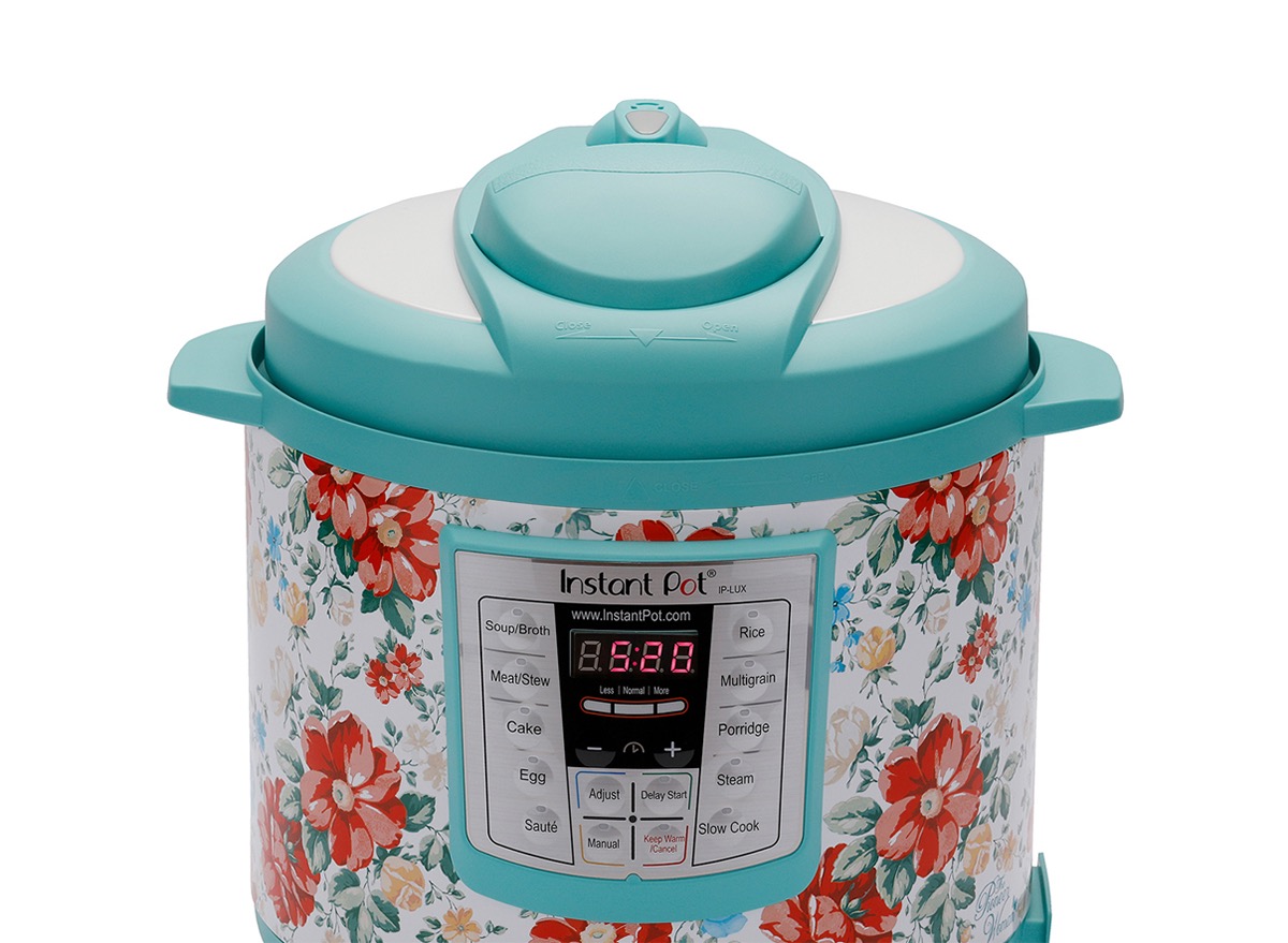 floral instant pot with green lid on white background