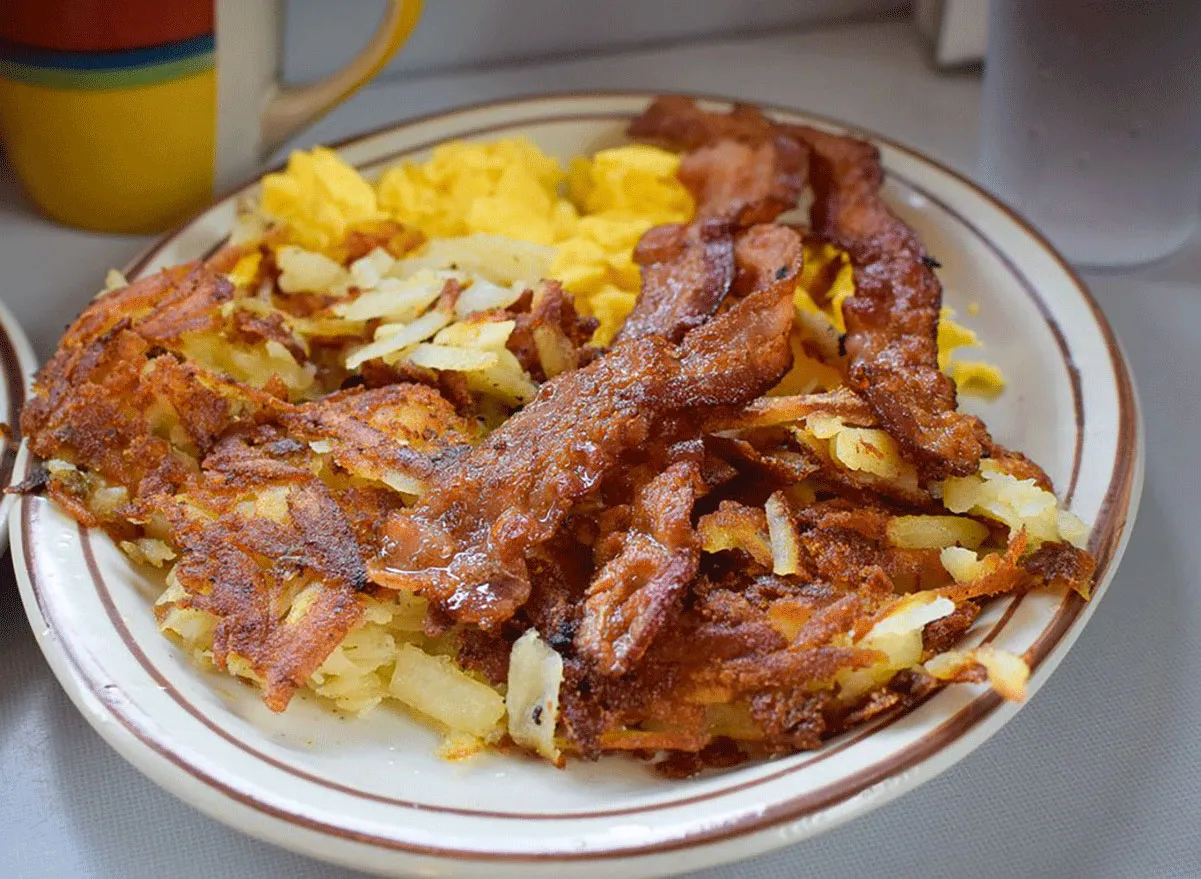 eggs, hashbrowns and bacon on a plate from our kitchen