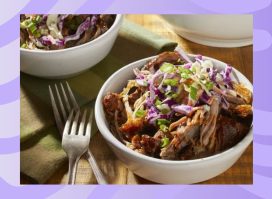 bowl of pulled pork on a purple background