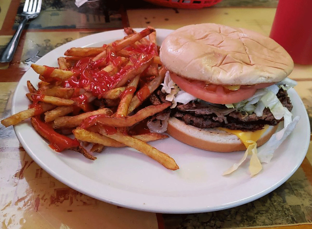 Onion burger with fries at sid's diner