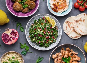 Plant-based diet mediterranean spread tabbouleh salad falafel chicken