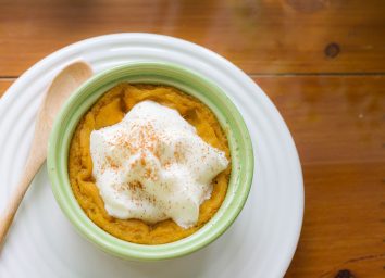 pumpkin pudding with whipped cream on top
