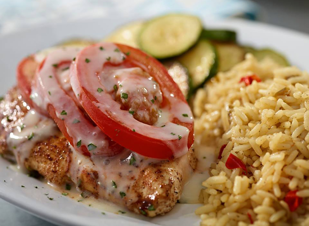 ruby tuesday chicken fresco with a side of rice and zucchini