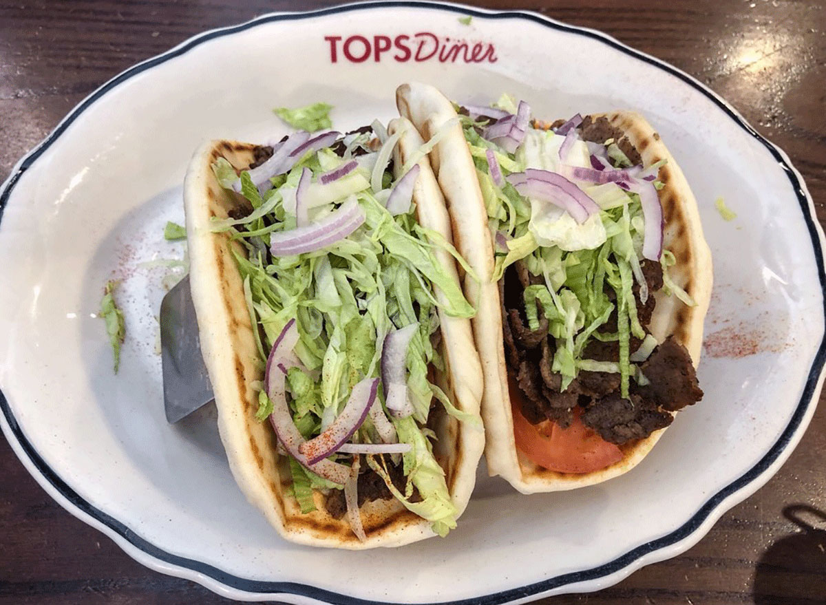 tacos with steak, lettuce and onion from tops diner