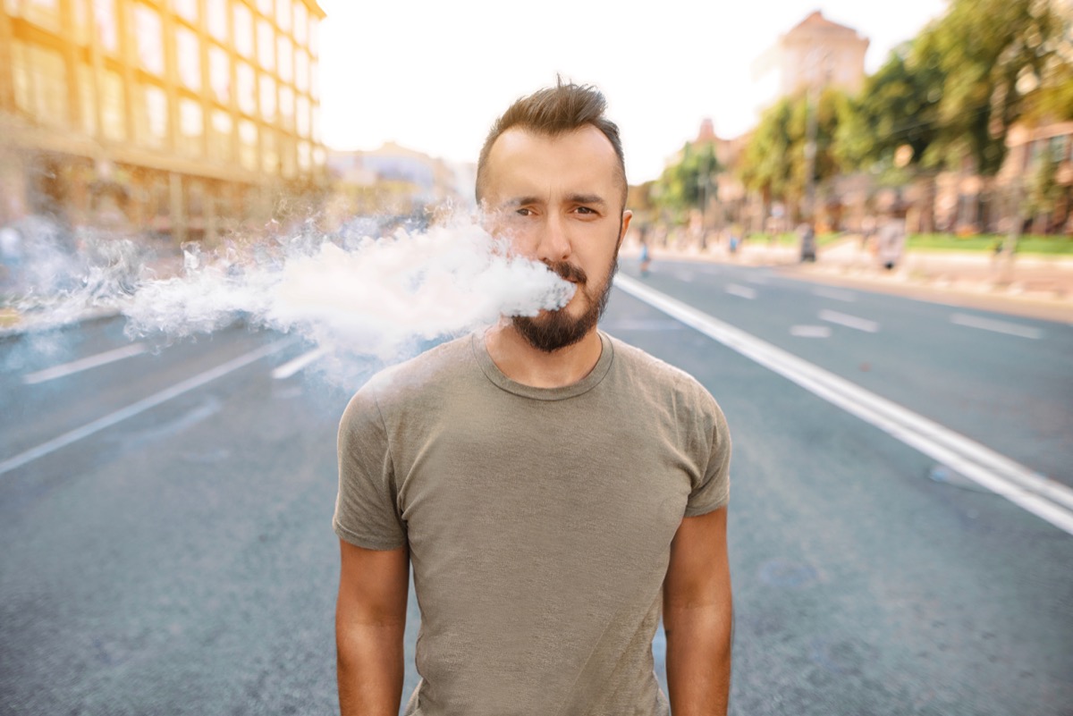 Vaping man smoke