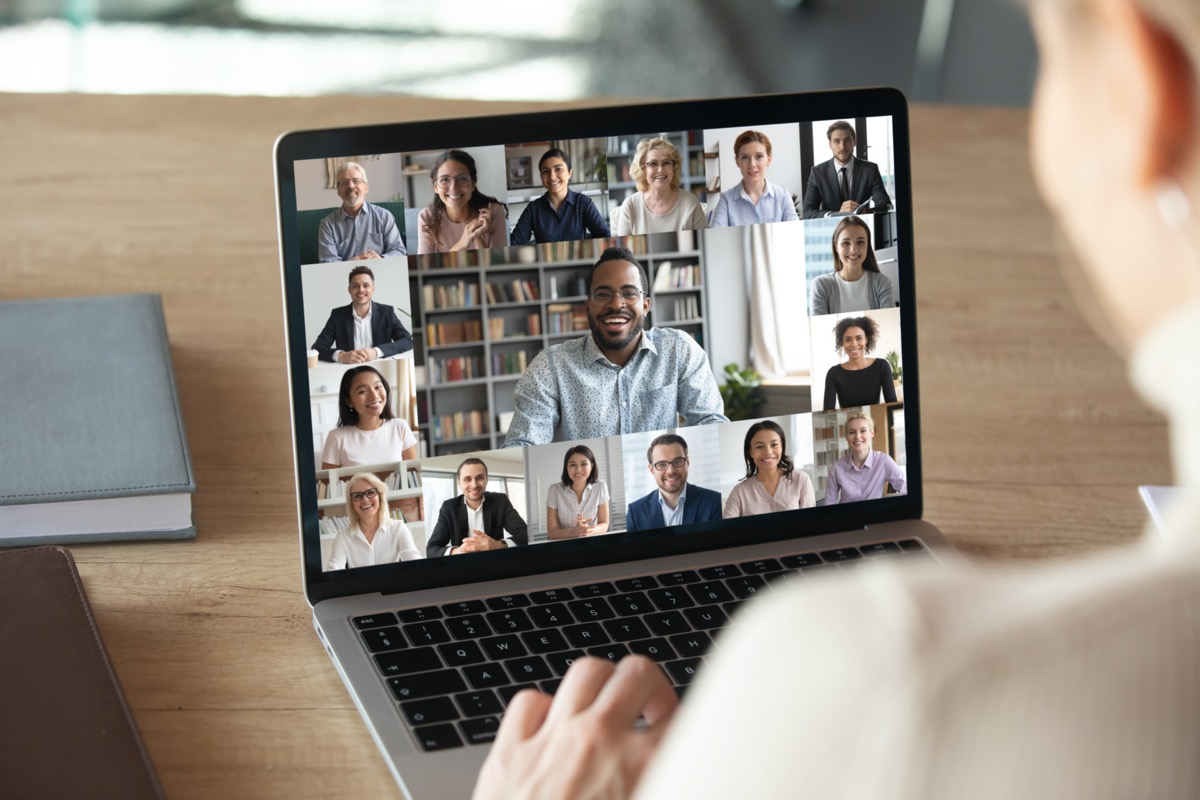 woman worker have Webcam group conference with coworkers on modern laptop at home