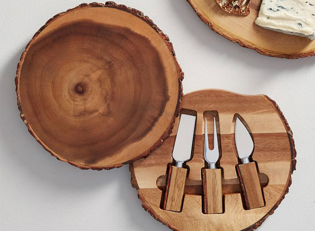 wooden serving plate and cheese serving utensils