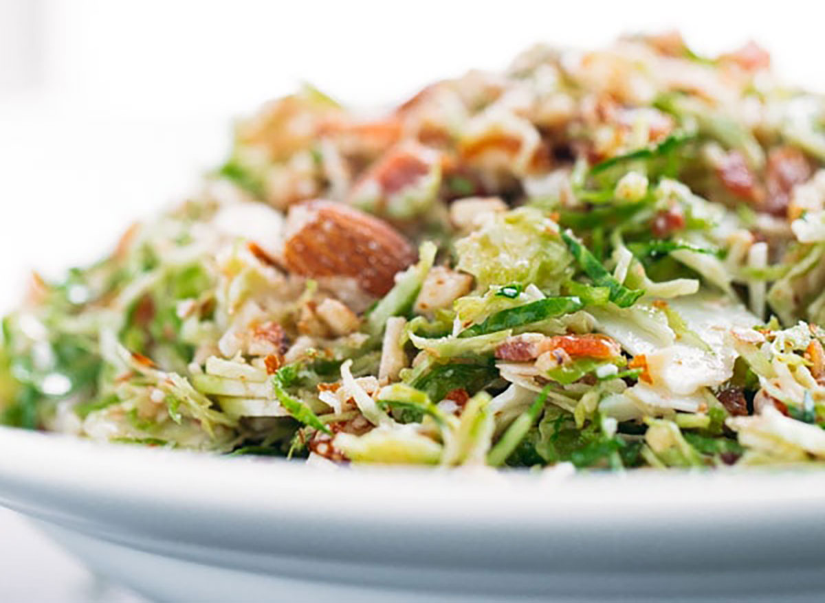 bacon and brussels sprouts salad in white bowl