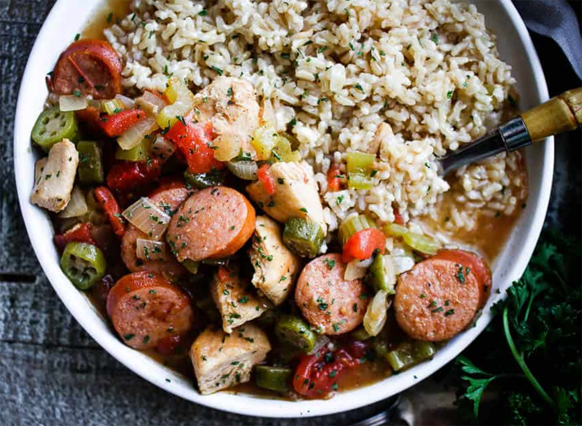 bowl of chicken and sausage gumbo with rice
