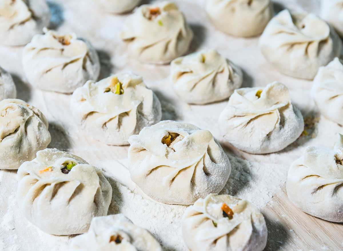 traditional chinese steamed buns on wooden block