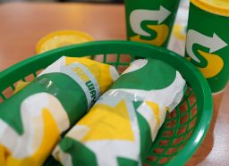 closeup of subway subs with drinks