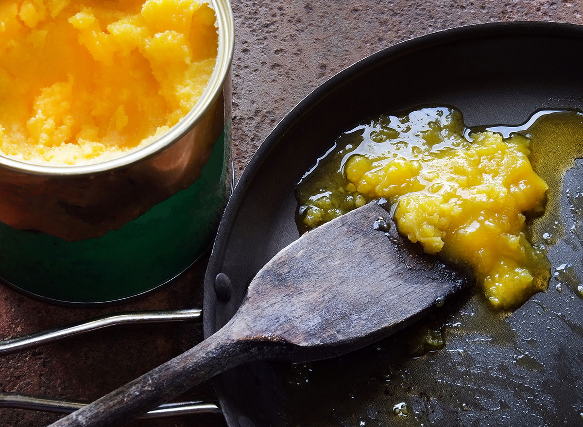 cooking with ghee in a back pan