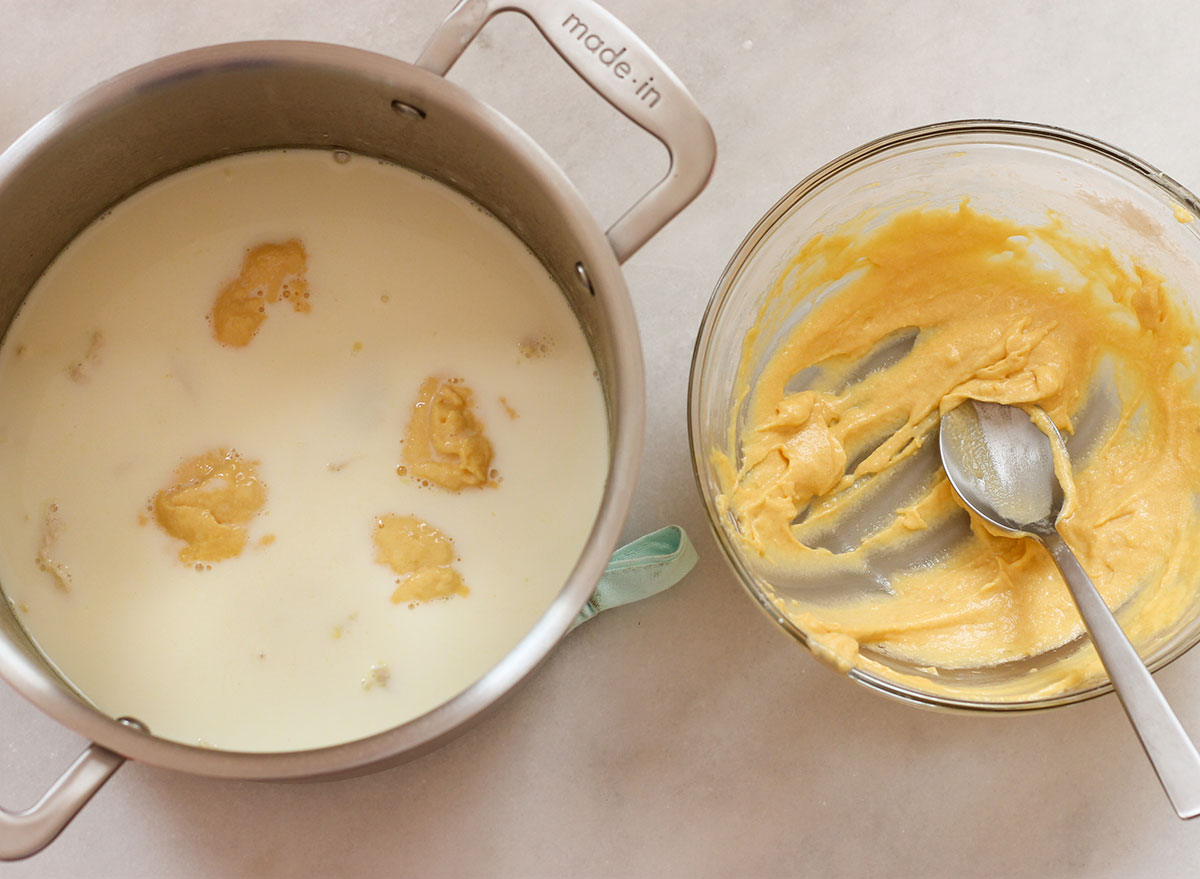 Dropping dumpling mixture into the stockpot