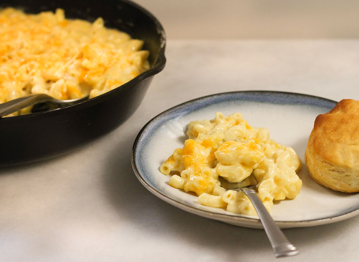 Copycat Cracker Barrel mac and cheese on a plate with a biscuit