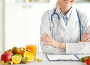 female nutritionist working in her office