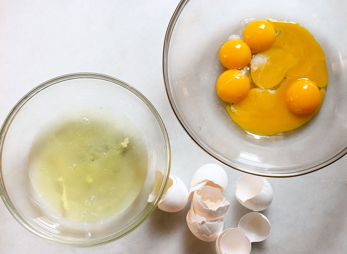 separating egg yolks and eggs into two bowls