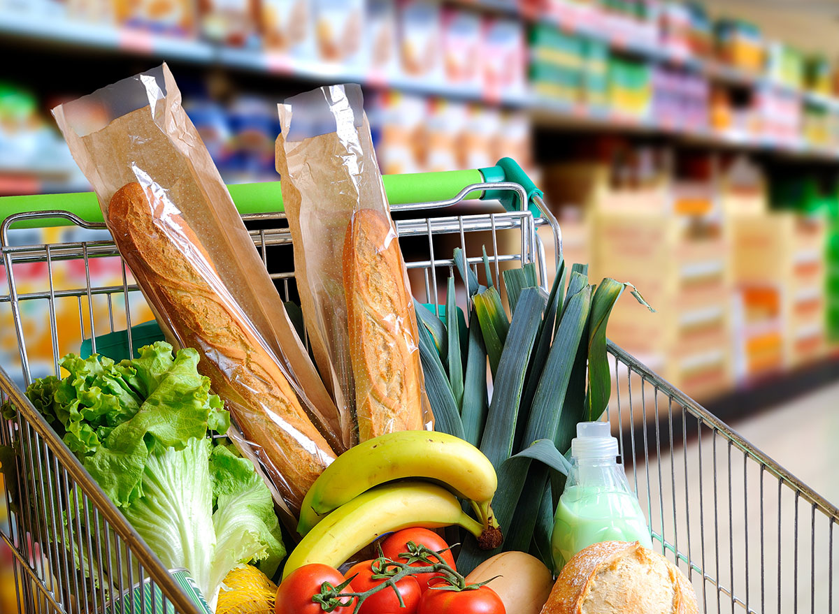 Fresh groceries in a shopping cart at the grocery store