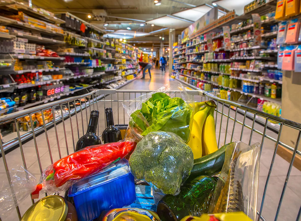 Cart full of groceries in a grocery store