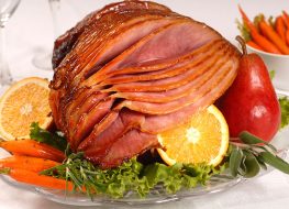honey glazed ham with fruits and vegetables