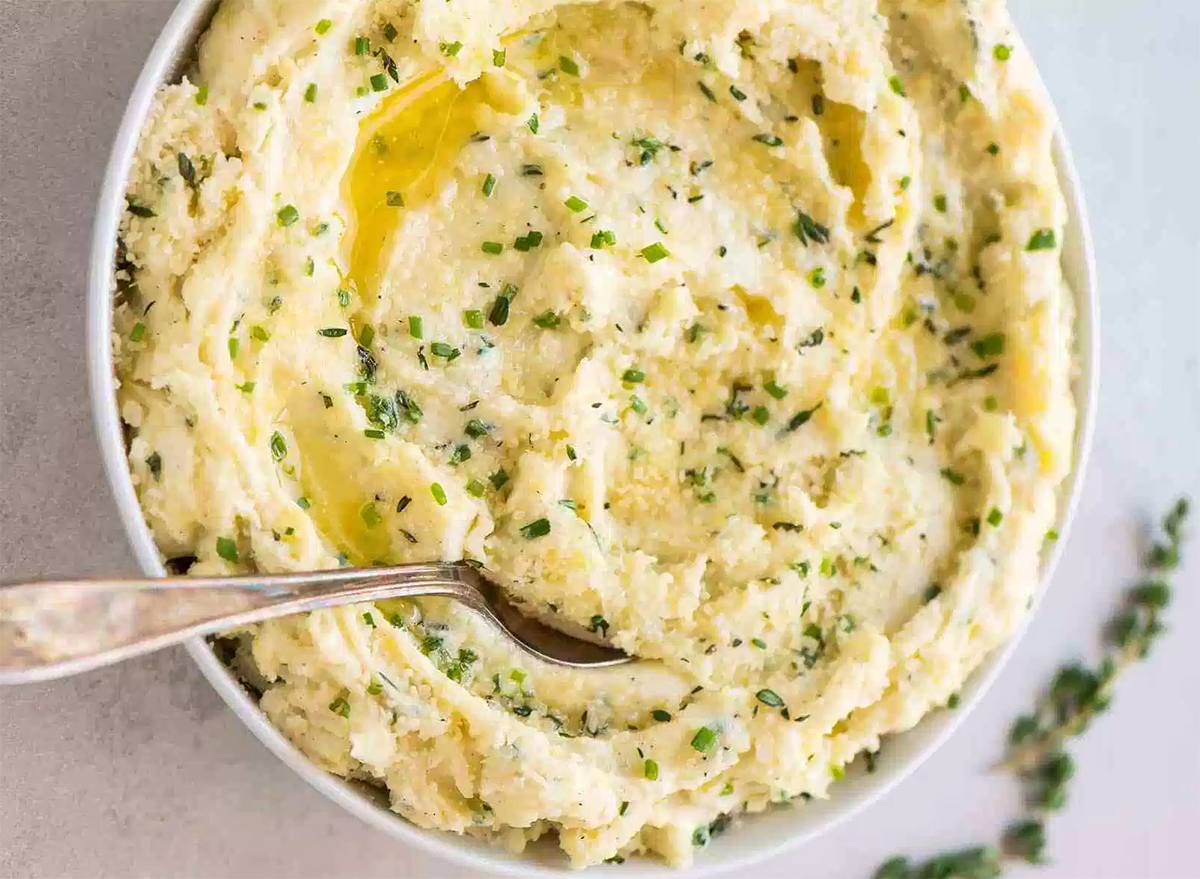 mashed potatoes in bowl with spoon
