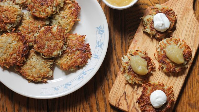 Finished latkes with sauces ready to eat on Hanukkah
