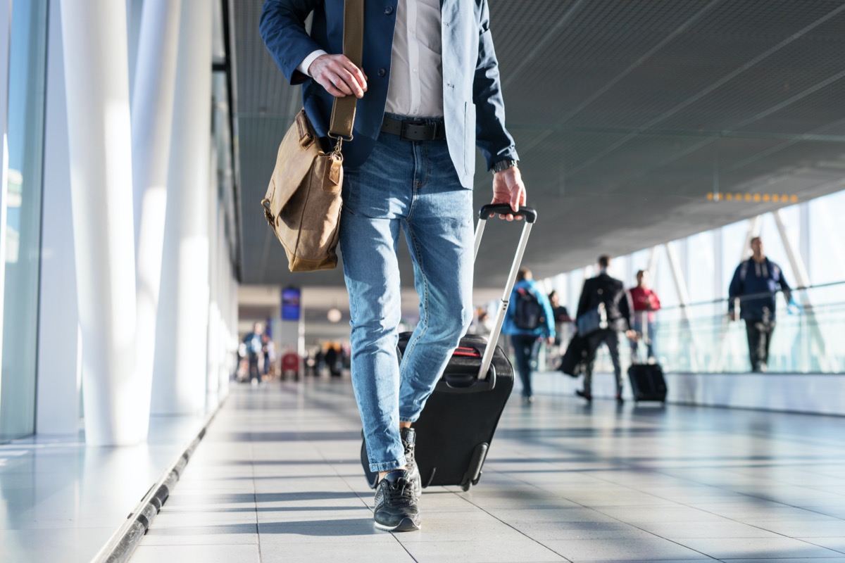 Man traveling airport bags
