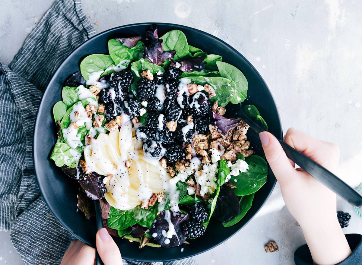 bowl of pear and blackberry green salad