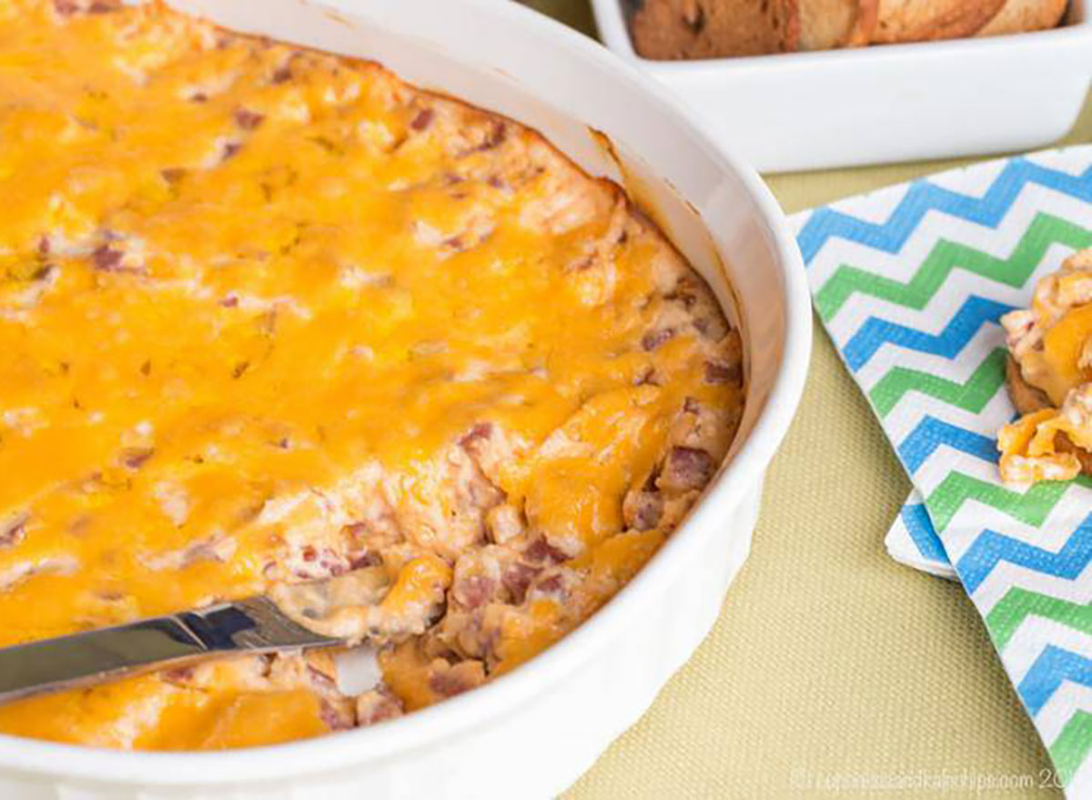 pork roll cheese dip spread in serving dish with knife