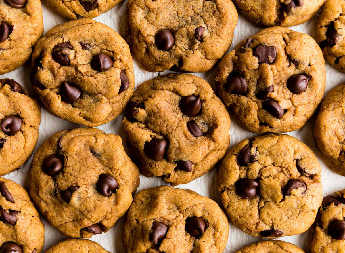 pumpkin chocolate chip cookies on parchment paper
