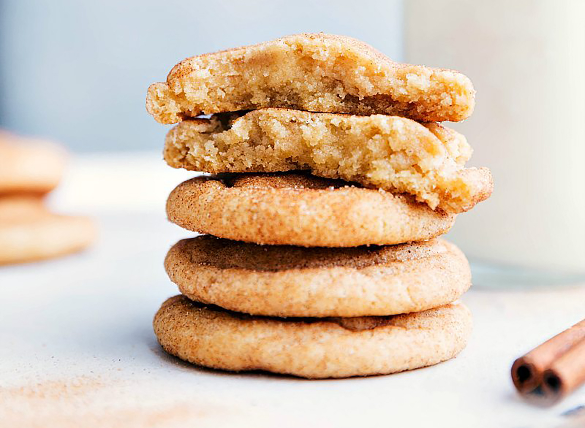 stack of five snickerdoodle cookies with cinnamon sugar dust