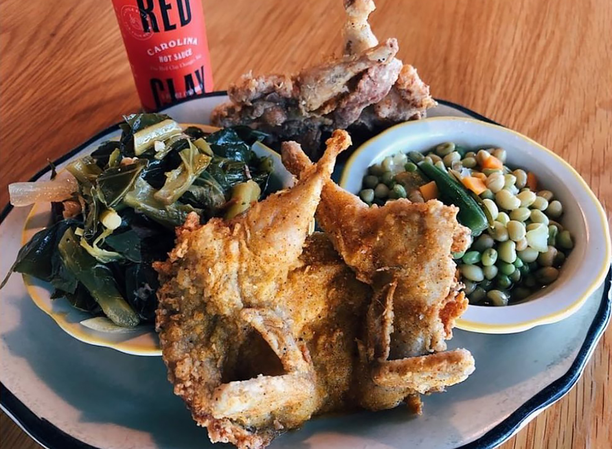 plate of fried chicken and collard greens