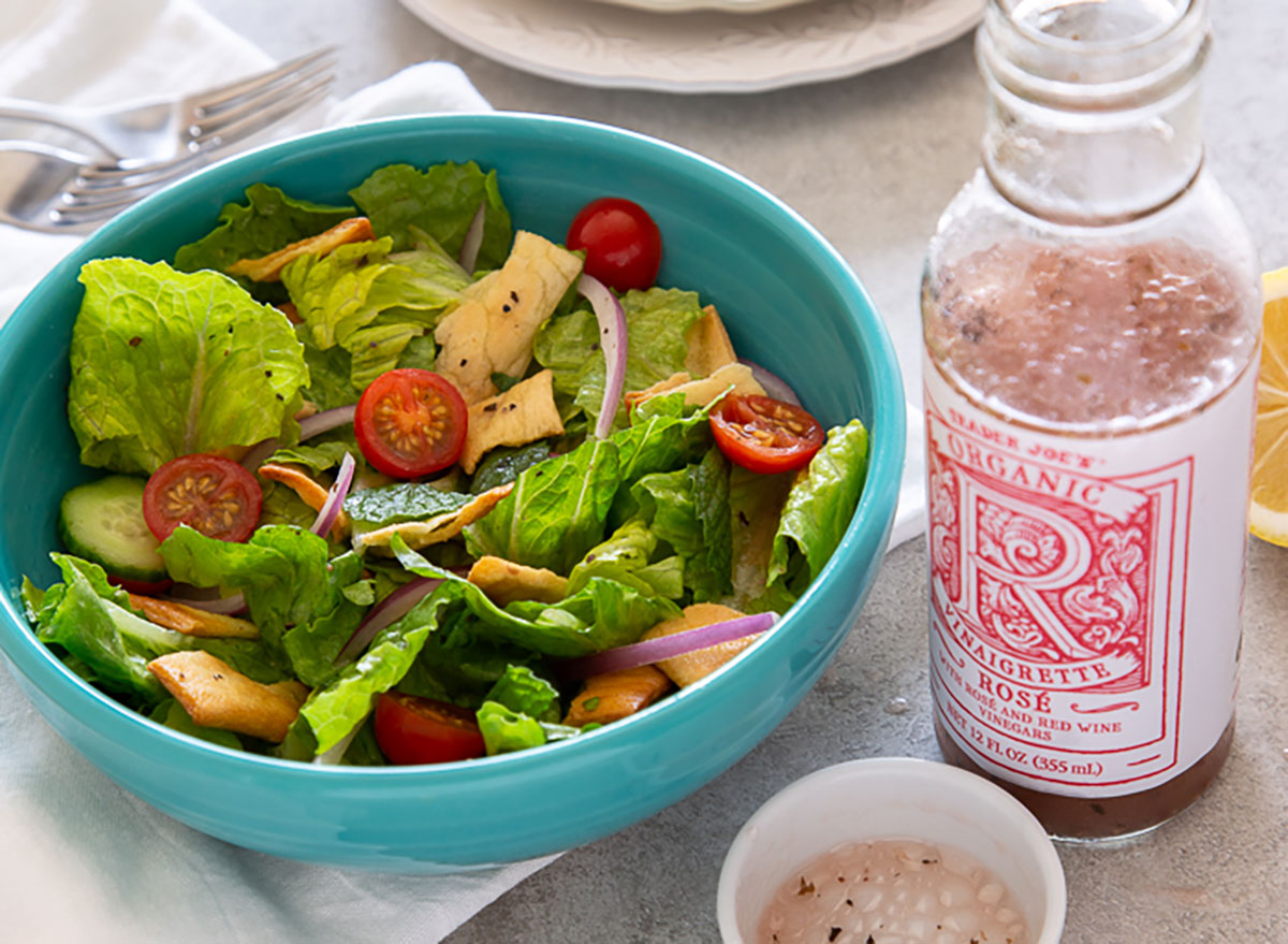 trader joes organic rose vinaigrette bottle with bowl of salad