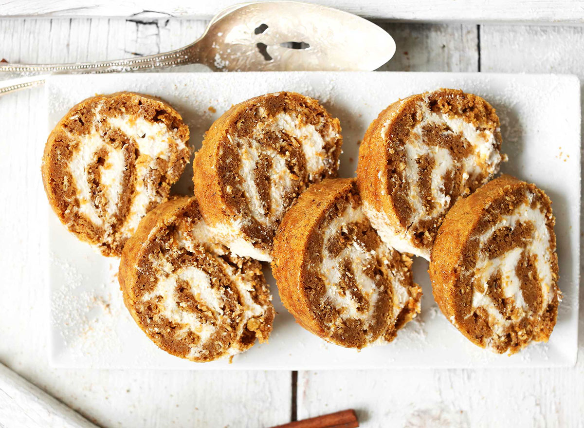 vegan pumpkin roll slices on serving board