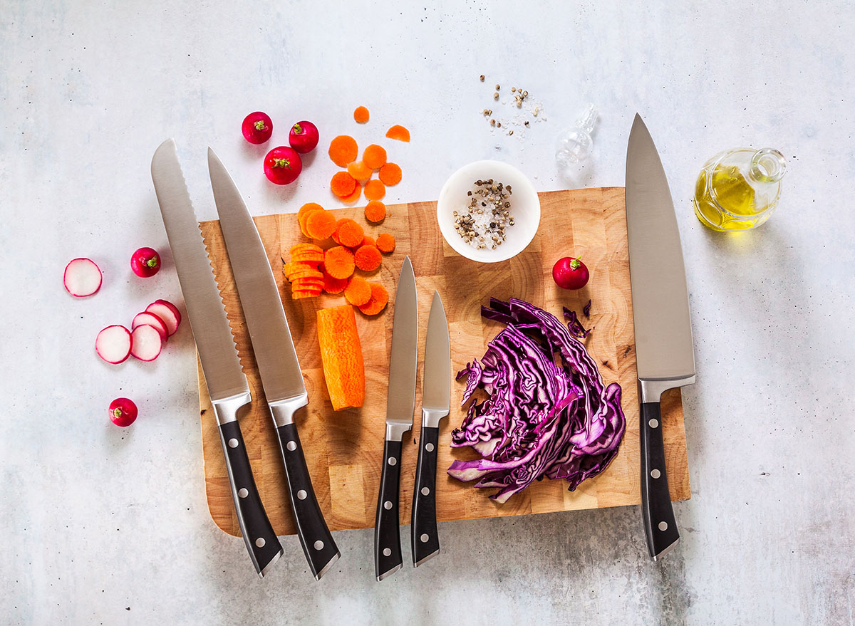 veggies and knives on cutting board