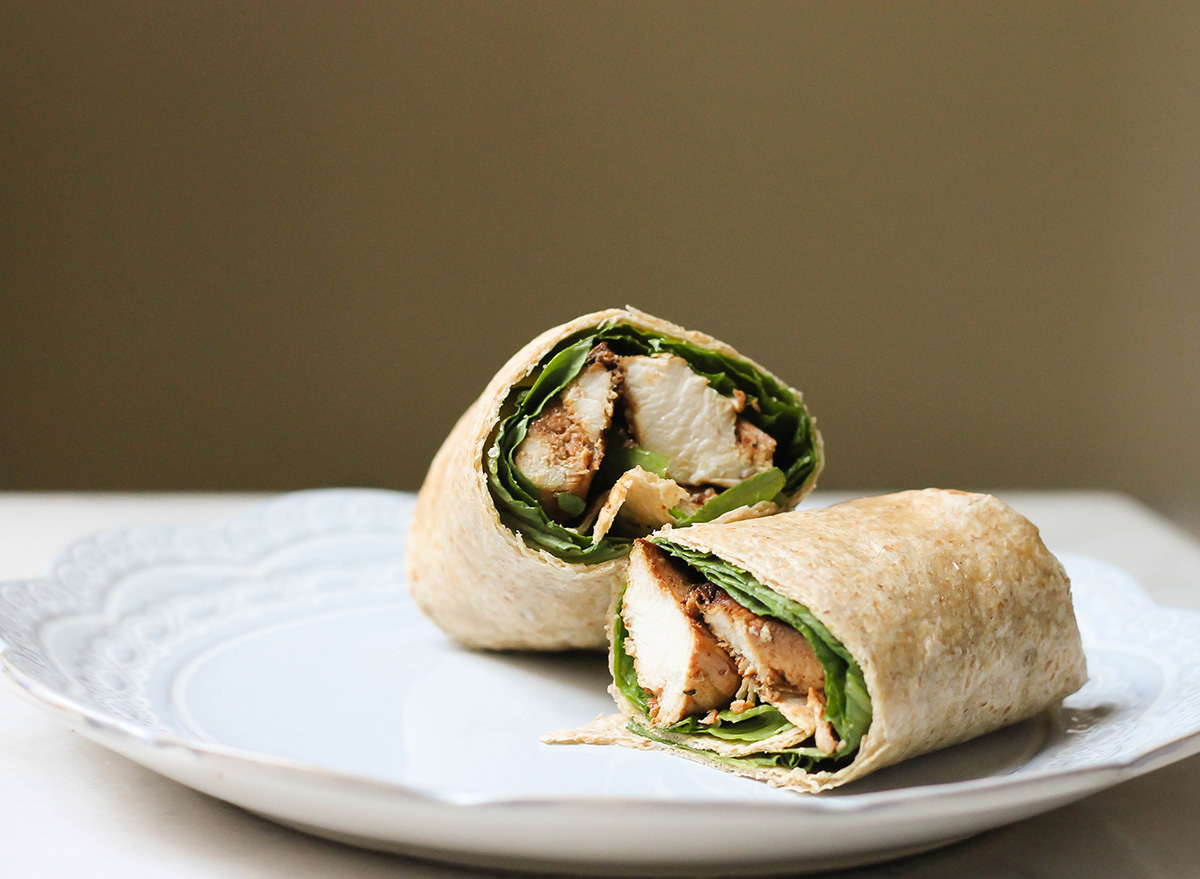 chicken wrap on a blue plate