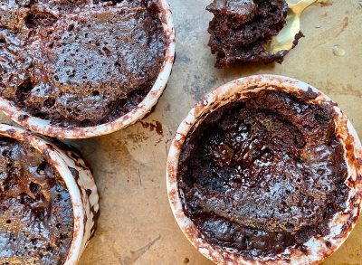 Whole30 instant pot chocolate pudding cakes in ramekins on table