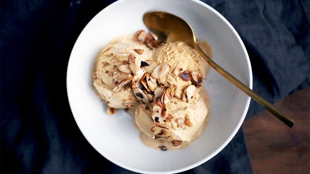 Whole30 banana coconut ice cream topped with almonds in a bowl