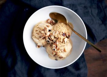 Whole30 banana coconut ice cream topped with almonds in a bowl