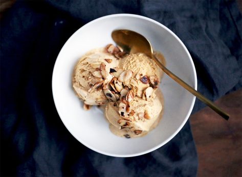 Whole30 banana coconut ice cream topped with almonds in a bowl