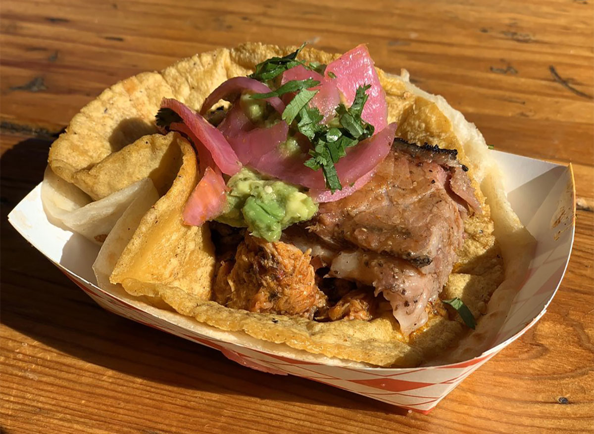 brisket taco with pickled onions