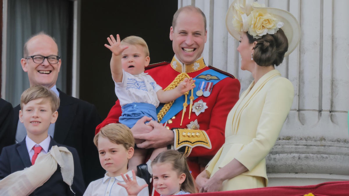 prince george prince louis prince william princess charlotte and kate middleton stand on a balcony