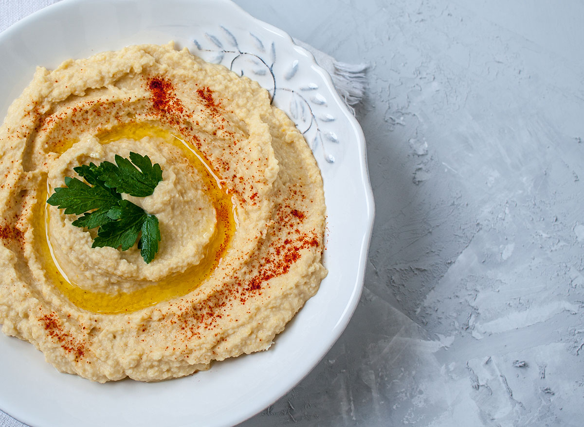 classic hummus with paprika and garnish