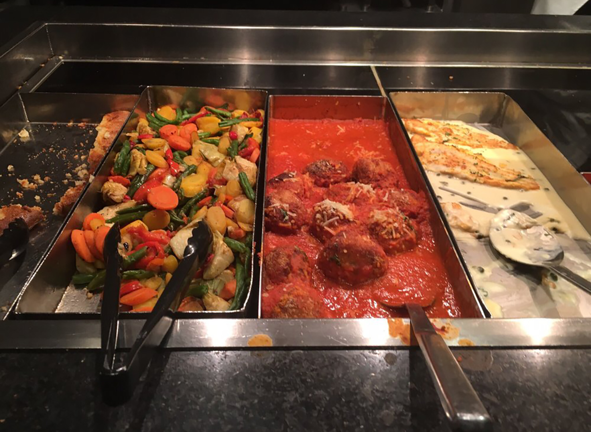 meatball and vegetable serving stations at corner market buffet in las vegas