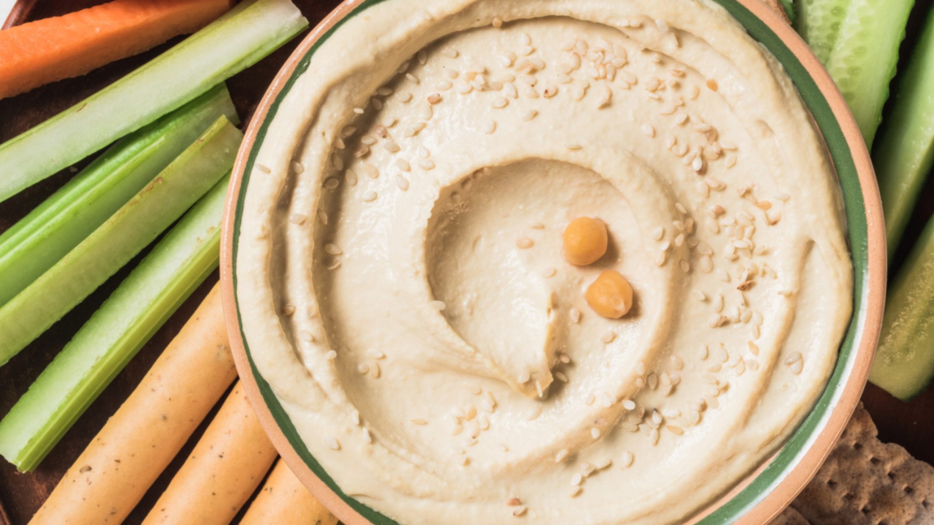 The Biggest Danger Sign You’re Eating Too Much Hummus, Say Experts