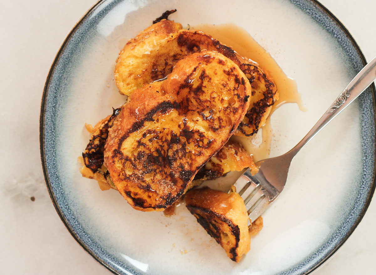 finished homemade french toast on a plate with syrup