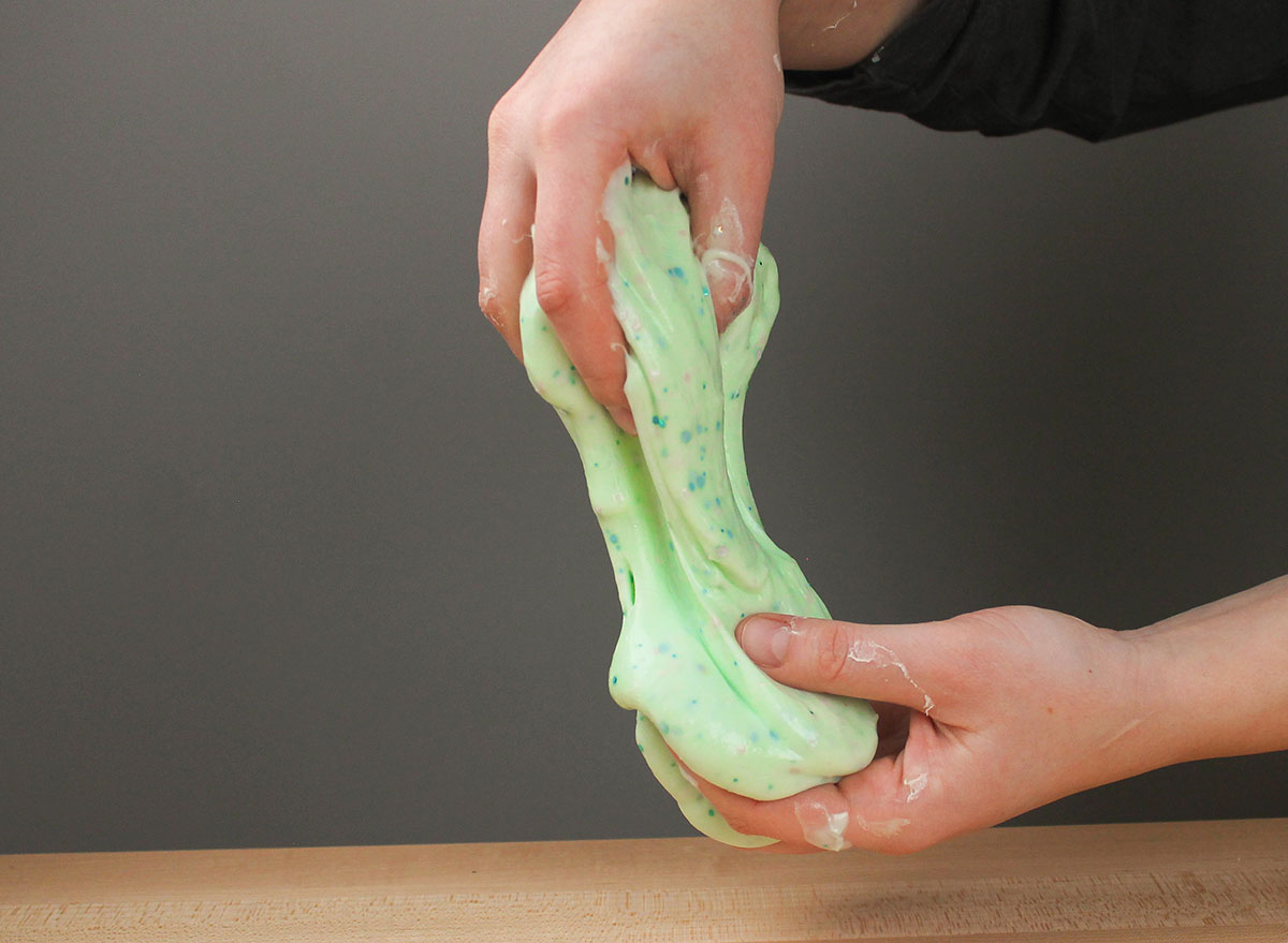 pulling slime with hands