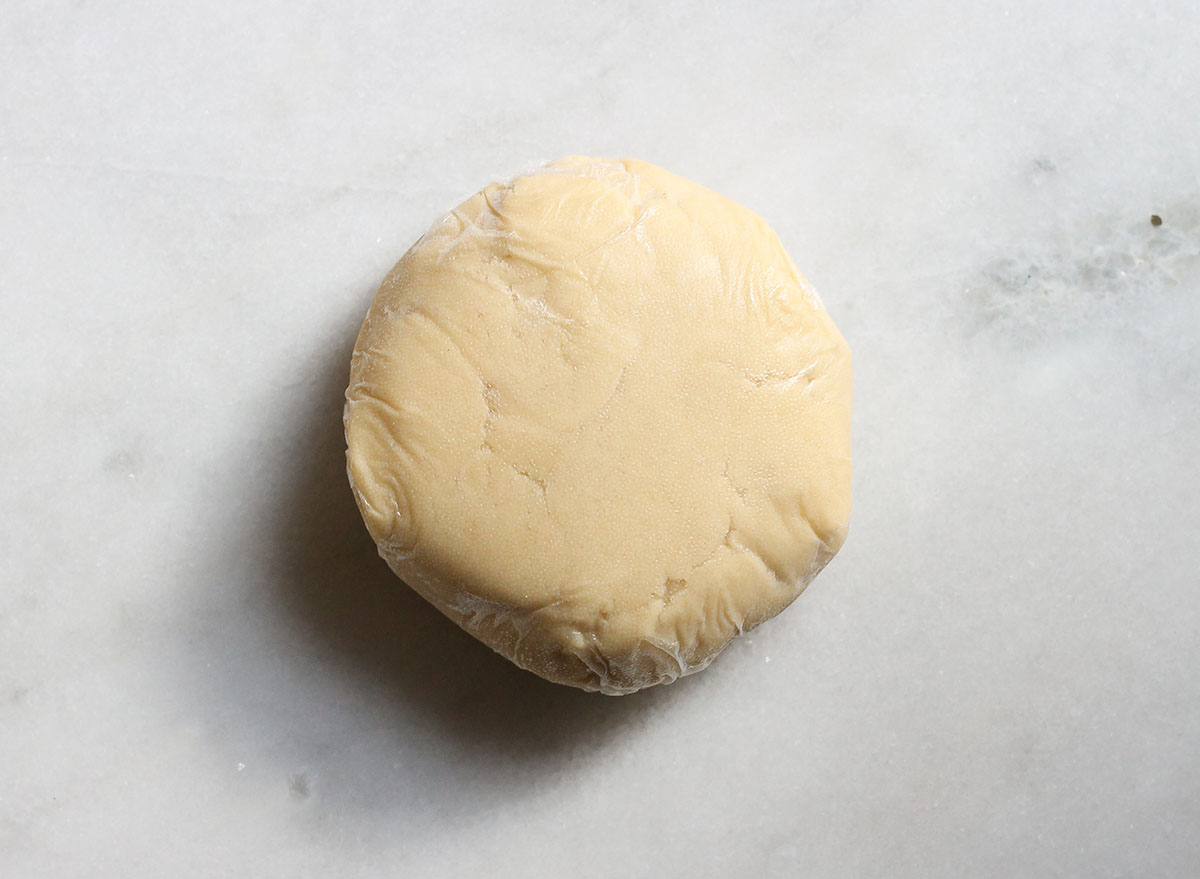 chilled thumbprint cookie dough on a marble counter