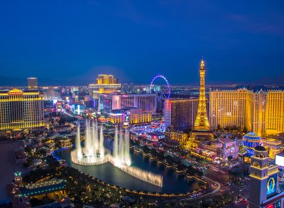 las vegas strip and skyline with eiffel tower replica and bellagio fountains